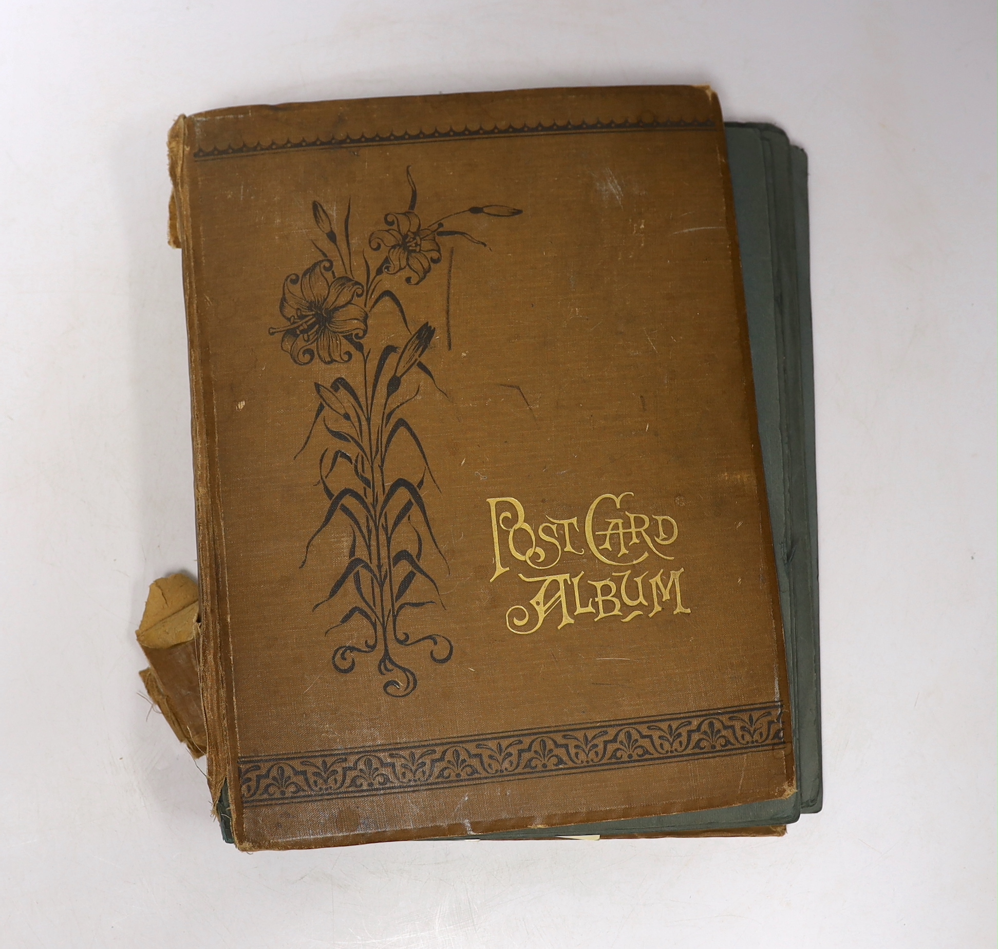 A postcard album and various early 20th century postcards, of various views of UK towns, etc.